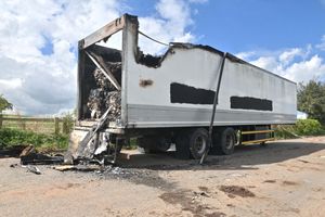 Police are treating the fire as "arson". MP Helen Morgan said the trailers should have been removed months ago.