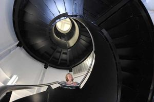 Marketing manager Jane Williams on the college's spiral staircase