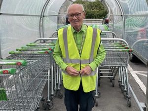 Supporting image for story: Shrewsbury supermarket celebrates 'inspirational' porter still serving customers at 89