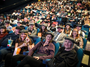 Supporting image for story: Peaky Blinders fans pack out Dudley cinema in flat caps and sharp suits for celebration of new film