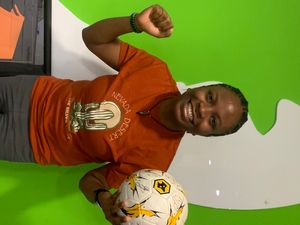 Supporting image for story: Bid for a signed Wolves shirt and football - and help students in Ukraine