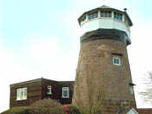 Supporting image for story: Windmill home with unique history