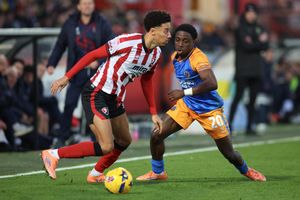 Hakeeb Adelakun of Cheltenham Town and Ismeal Kabia of Shrewsbury Town