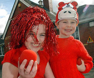 Pupils at Carreghofa Primary School dreesed up in red clothes. Pictured are Rachael Arthur, nine, and Edward Breeze, four.