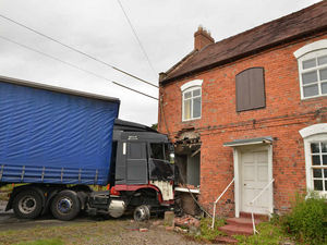 Supporting image for story: Video and pictures: Lorry crashes into house on A41 in Shropshire closing the road for two days
