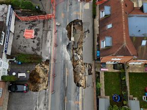 Supporting image for story: Investigations continue after sinkhole shuts Surrey street