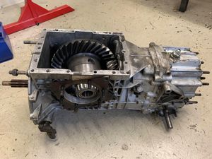 Work commences on removing some of the damaged tubes that form the rear structure of the car’s chassis