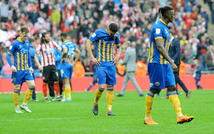 Town players trudge off at full time