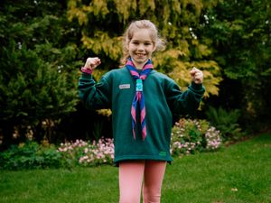 Supporting image for story: May's Mile a Day Challenge wins her a special Cub Scouts award