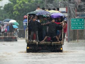 Supporting image for story: Tropical storm leaves at least 14 dead in the Philippines