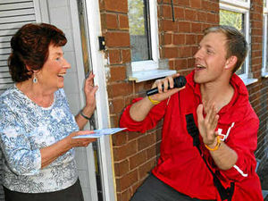 Supporting image for story: Singing postman's hitting all the right notes