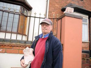 Supporting image for story: Cruel vandals decapitate pig statue with paving slab