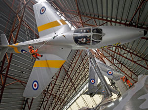 Supporting image for story: Daredevil cleaners give RAF Cosford museum planes a dusting