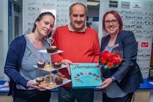 VIP guest Malcolm Lloyd received a luxury afternoon tea hamper as a thank you for declaring the new Scrivens Opticians & Hearing Care, Leominster branch open. He is pictured with Jeannette Dillon (left) and branch manager Hannah New