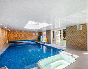 The personal pool also includes a jacuzzi, and plenty of space to entertain guests on the weekends