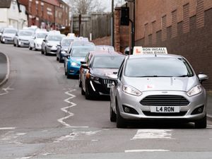 Supporting image for story: Full speed ahead as Whitchurch driving test protest hits town's roads 