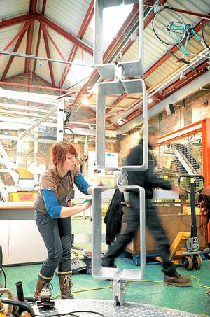 Hydi Burnham, from York, works on the sculpture at Enginuity