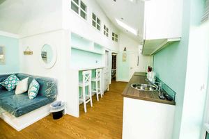 The kitchen and living area inside the specially-erected 'quick build' bungalow