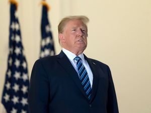 Supporting image for story: Trump remains out of sight as doctor says he is symptom-free