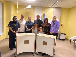 The Bereavement team from Maternity at the Midland Metropolitan University Hospital with Holly, Lee, Daisy and Chloe Gisby. 