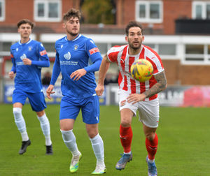 Reece Styche chases the ball.