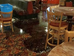 Supporting image for story: Watch: Water rushes through ceiling at Tipton social club amid heavy storms