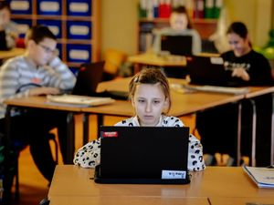 Supporting image for story: Teachers deliver laptops amid lockdown