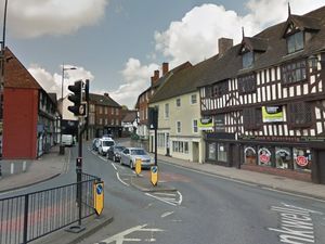 Supporting image for story: Shrewsbury road closed as man helped down from window ledge