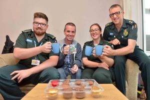 Paramedics Ben Gumsley, Martin Sproston and Rosie Tudor with Peter Corr