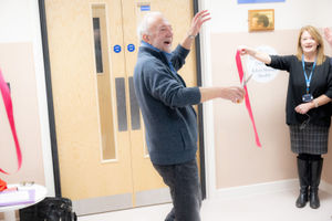 Austin Allen, partner of the late Drew Richardson, unveils a plaque dedicating the new Richardson Centre (PTHB)