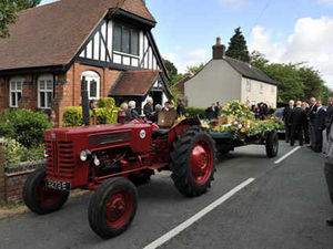 Supporting image for story: Flamboyant funeral for character Bruce