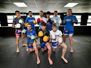 Supporting image for story: Crop of champions visit new Walsall kickboxing gym to celebrate opening