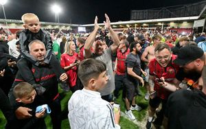 Walsall fans celebrate reaching Wembley.