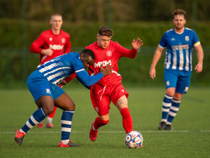 Action from Shawbury United's heavy defeat at Stafford Town. Pic: Kieran Stoddart