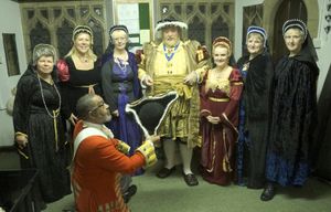 Henry VIII with his Wives and Rugeley Town Crier Adrian Basford paying his respects to the King. 