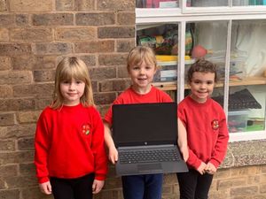 Supporting image for story: School receives laptop donations