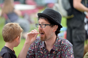 Matt Crisp registers as a blood stem cell donor at the DKMS tent