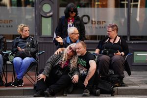 tearful fans could be seen waiting for the procession to arrive