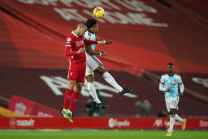 Fabinho of Liverpool and Adama Traore of Wolverhampton Wanderers (AMA)