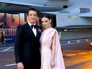 Supporting image for story: Miles Teller has wife’s wedding dress that was lost in fire remade for Christmas