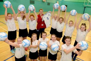Grace Smith with pupils at Oldbury Wells School