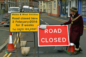 Councillor Connie Granger by the road closed signs in High Street, Wem. The road has been closed for gas main repairs.