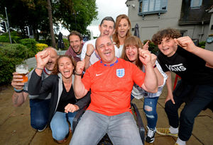 Ronnie Owen and his family cheer on England at the Claregate in Tettenhall