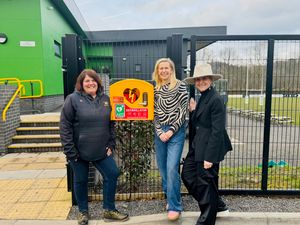 Bridgnorth Rugby Club has received a new defibrillator. In picture from left to right: Club Secretary Nerys Arch, trustee atThe Henry Angell James Memorial Trust Claire Marsh and charity founder Sally Angell-James.