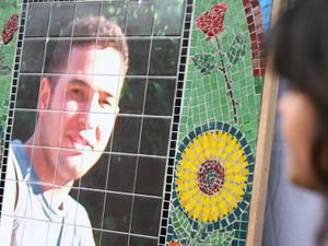 A mosaic of Jean Charles de Menezes outside Stockwell Tube station