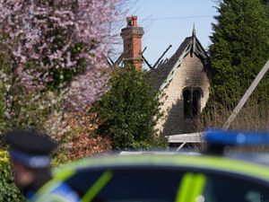 Emergency services at a property in Beswick Close, Rushton after three people died in a house fire in a village near Kettering
