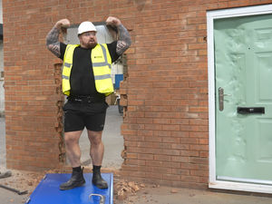 Supporting image for story: World's Strongest Man winner Eddie Hall puts Black Country firm's steel doors to the test for video