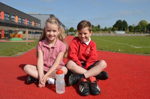 Isabelle Bowman and Jacob Morgan on the Daily Mile track
