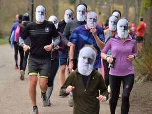 Supporting image for story: Shrewsbury parkrunners don Charles Darwin masks to kick off festival celebrating town's famous son