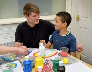 Luca enjoying painting with Jay